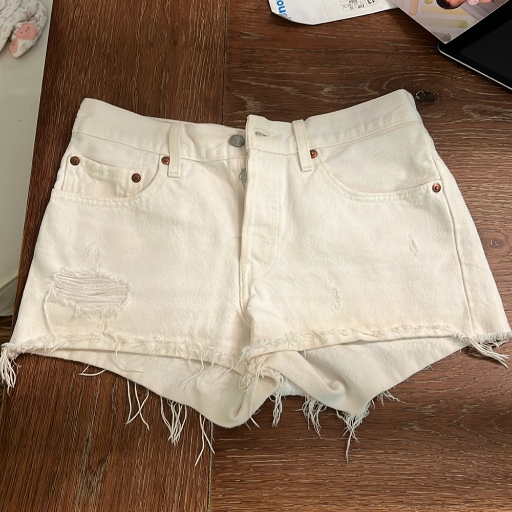 Levi’s 501 cut off white jean shorts